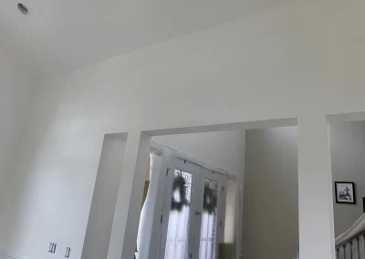 Interior painting Redmond WA — bright entryway finish with smooth wall coats