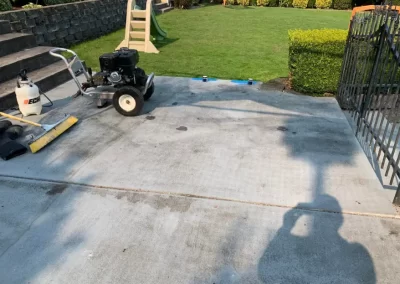Pressure washing and exterior prep Redmond WA — driveway being cleaned before exterior repaint